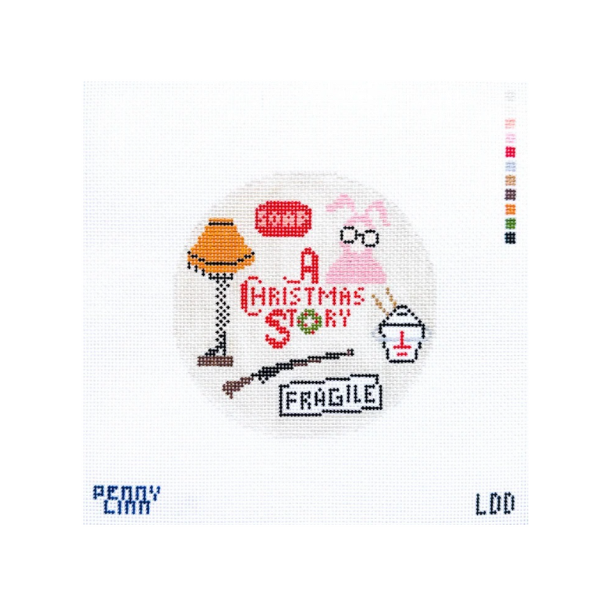 A circular cross-stitch design featuring the 'A Christmas Story' lamp, rabbit, glasses, and 'Fragile' text on white fabric, with 'Penny Cam' branding at the bottom left.