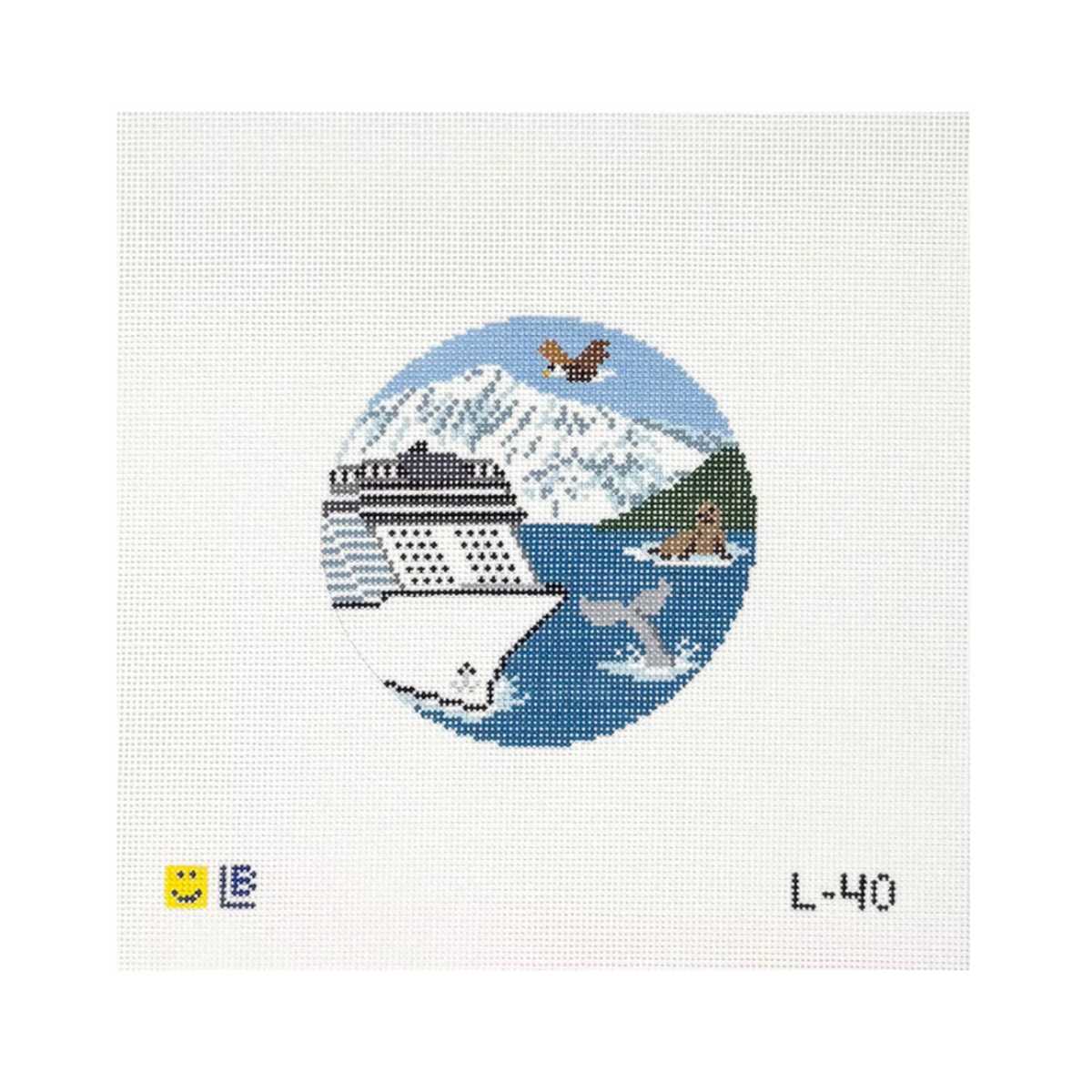A circular cross-stitch style design on a white canvas background, featuring a cruise ship on blue water with a snowy mountain, a bird, and a whale. Small text at the bottom reads 'L-40' with a small yellow smiley and blue letter mark on the left.