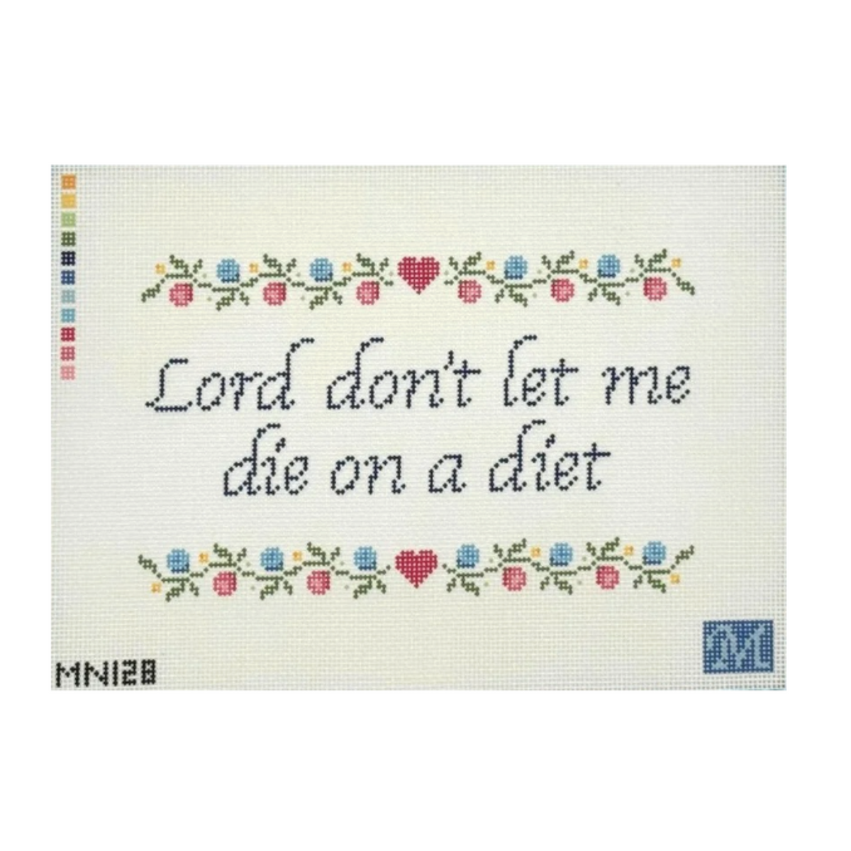A cross-stitch design card featuring the phrase 'Lord don't let me die on a diet' in dark blue script, framed by floral garlands with pink and blue flowers and green leaves. The card has a white mesh background, a vertical color palette strip on the left, the code 'MN128' at the bottom left, and a blue monogram logo at the bottom right.