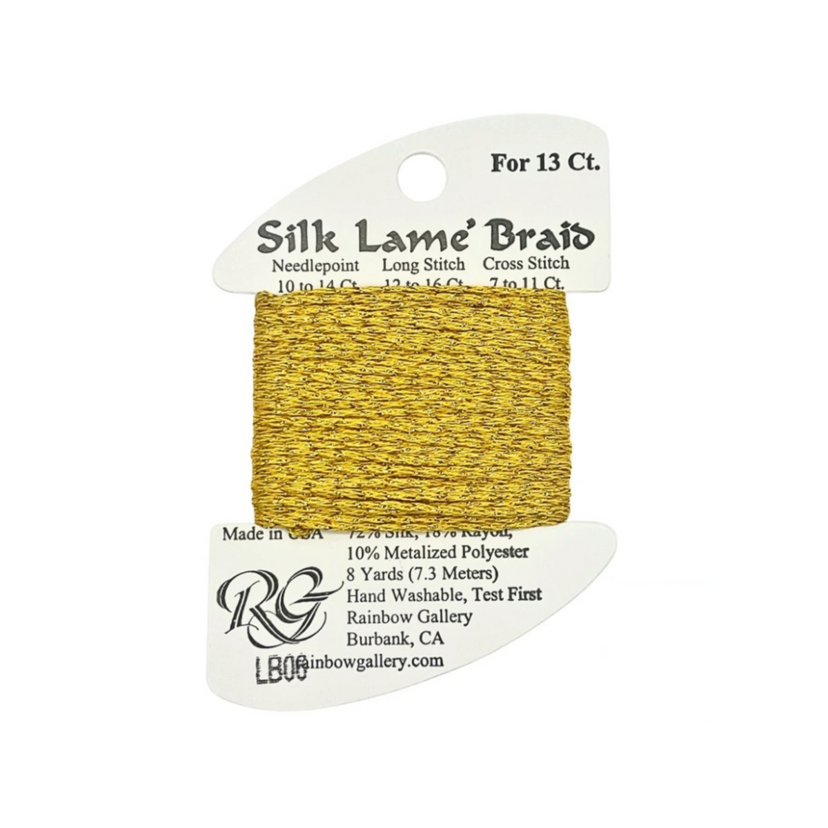 A spool of Rainbow Gallery Silk Lame' Braid needlepoint thread in metallic gold, mounted on a white cardboard hanger with product details printed on it.