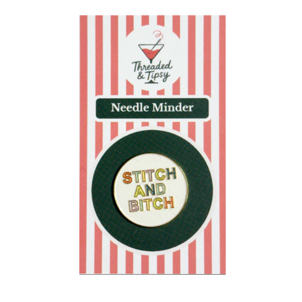 A circular enamel pin reading 'STITCH AND BITCH' in yellow and orange lettering, surrounded by a dark green ring, mounted on a red and white striped card labeled 'Threaded & Tipsy Needle Minder'.