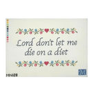 A cross-stitch design card featuring the phrase 'Lord don't let me die on a diet' in dark blue script, framed by floral garlands with pink and blue flowers and green leaves. The card has a white mesh background, a vertical color palette strip on the left, the code 'MN128' at the bottom left, and a blue monogram logo at the bottom right.