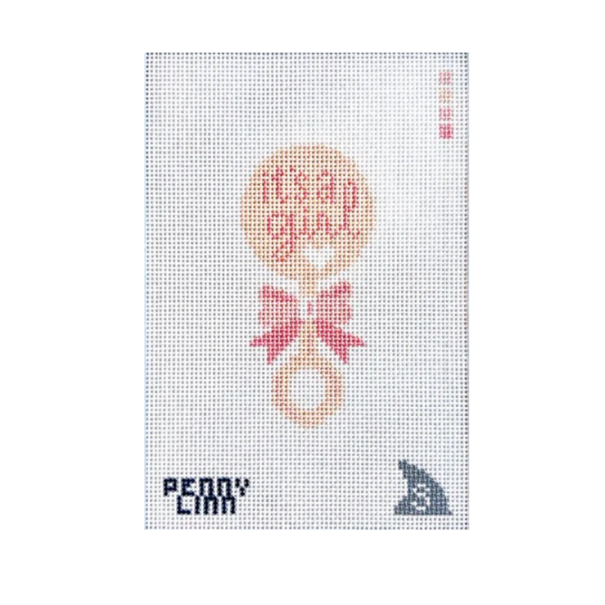 A needlepoint canvas featuring a baby rattle design with the text 'it's all good!' in pink, a pink bow, and the brand name 'PENNY CARR' in the bottom left corner.