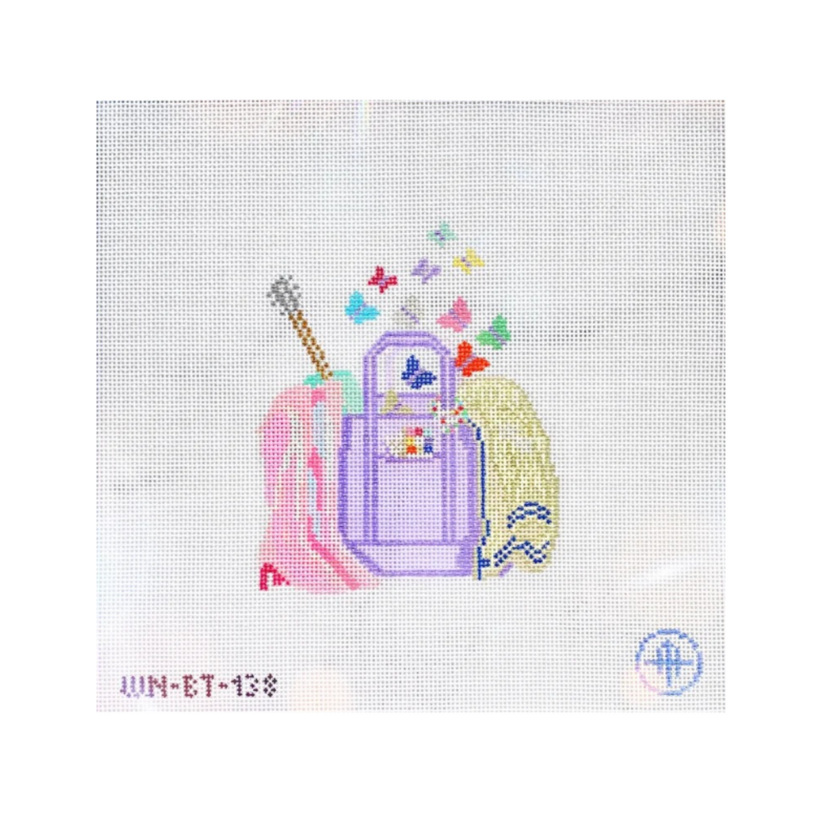 A needlepoint canvas featuring a purple backpack with colorful butterflies, a pink scarf, and a yellow hat on a white mesh background.