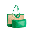 Green woven tote bag with a matching green pouch on a white background