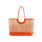 Woven handbag with orange handle and base on a white background