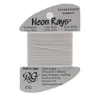 Neon Rays needlepoint ribbon on a gray card with brand information.