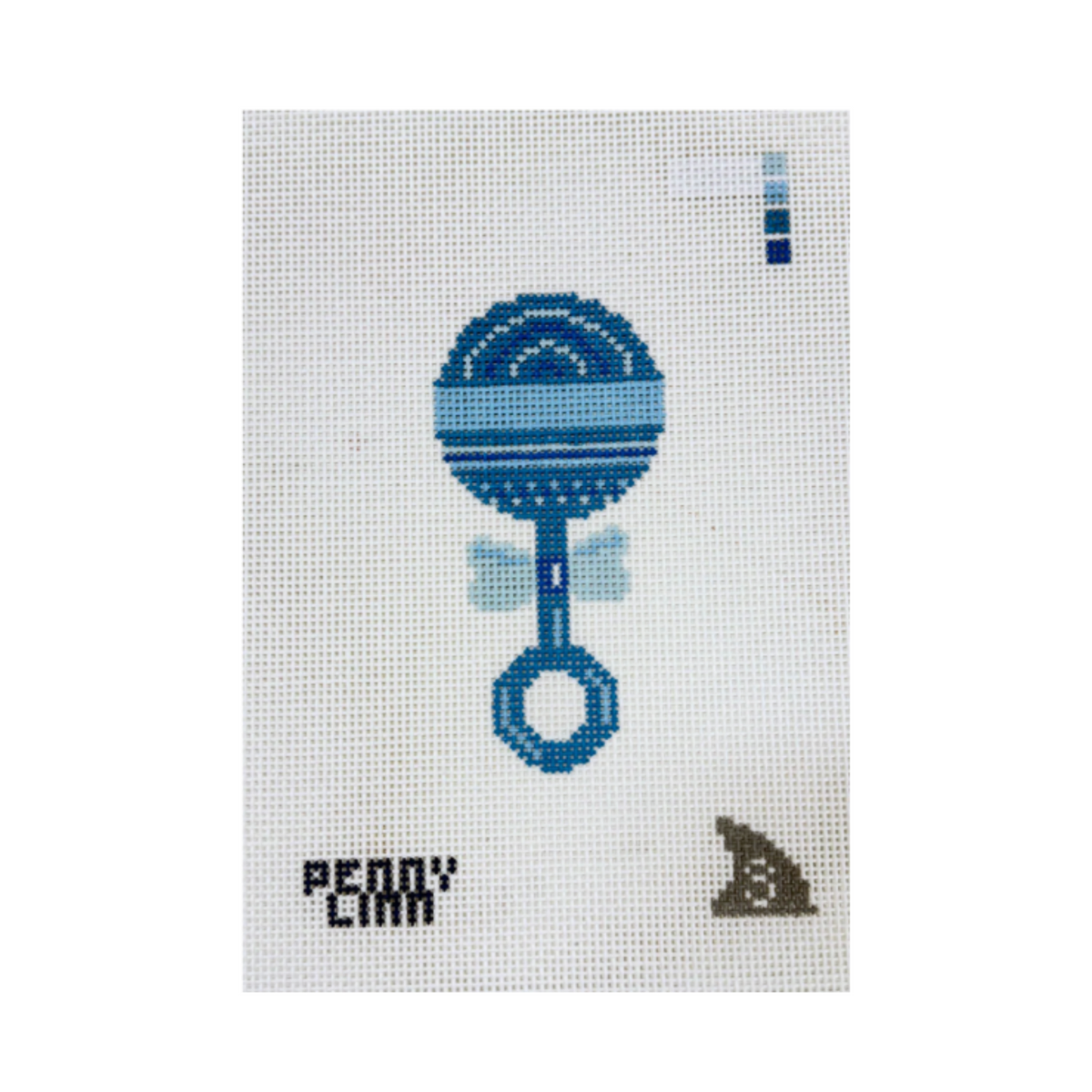 A cross-stitch canvas featuring a blue pixelated key design, the text 'PEONY CARM' in black, and a small brown paw print, on a white Aida cloth background.
