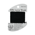 A spool of black Silk Lame Braids for needlepoint, shown on its original white cardboard packaging against a white background.