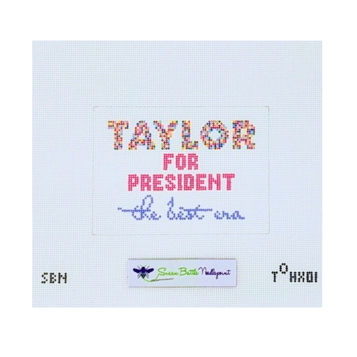 A cross-stitch style design on a white fabric background reading 'TAYLOR FOR PRESIDENT the best era' in multicolored, pink, and blue lettering, with a small Green Belt United States logo below.