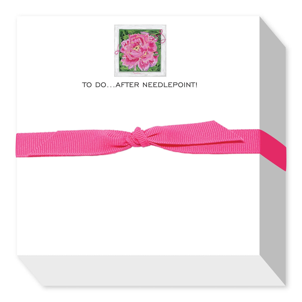White box with pink ribbon and floral design on a white background