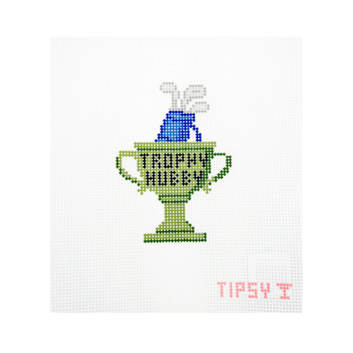 A cross-stitch canvas featuring a green trophy cup with a blue ribbon and white smoke, the words 'TROPHY MUFFLER' stitched inside, and pink text reading 'TIPSY T' in the lower right.