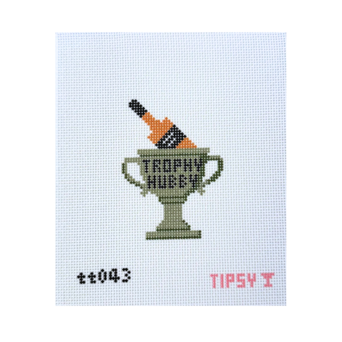 A needlepoint canvas featuring a pixelated trophy cup with a champagne bottle inside, the words 'TROPHY HUBEN' on the cup, and small red/pink text reading 'TIPS4Y' and 't0043' on a white grid background.