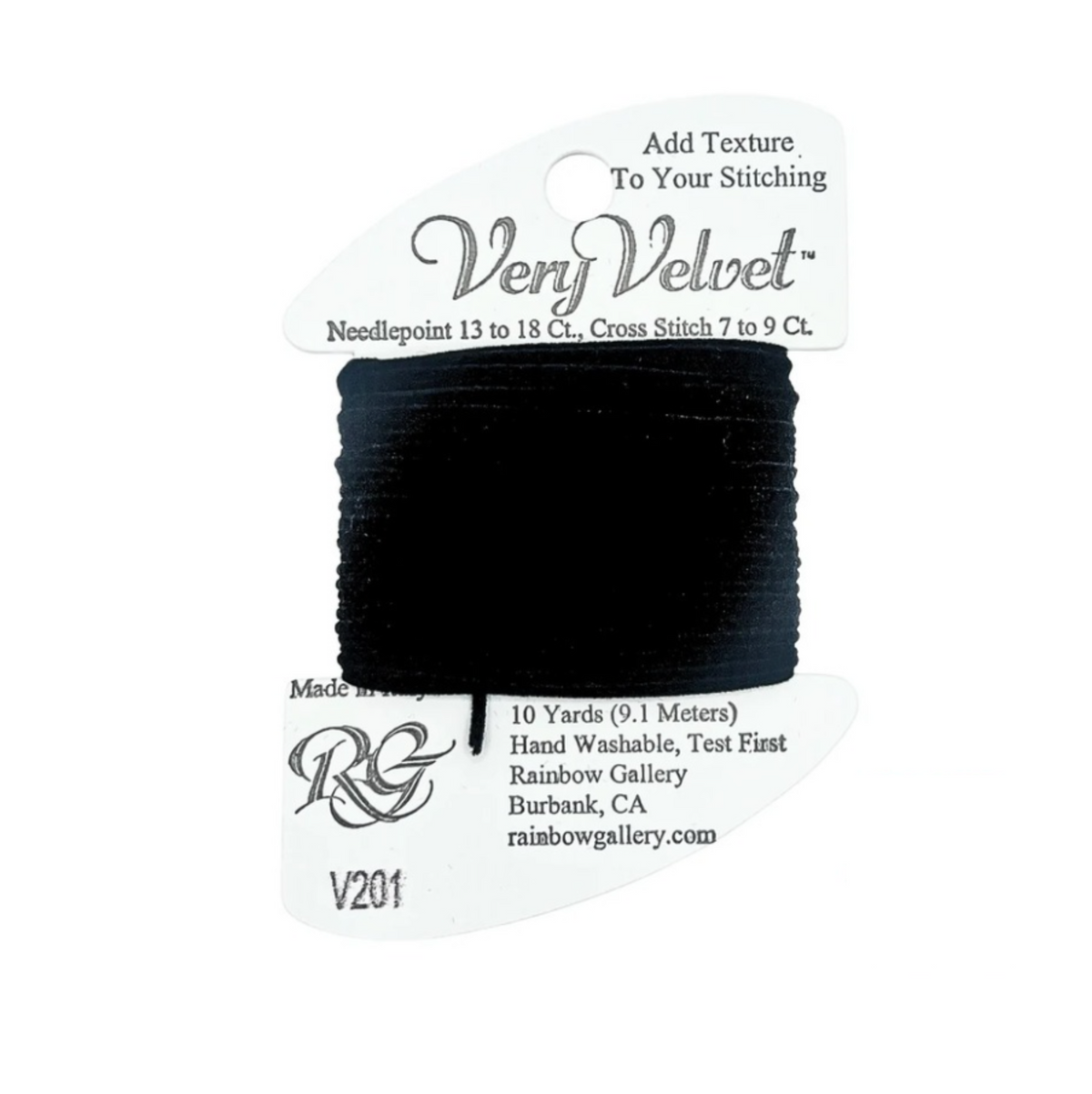 A spool of black thread wrapped around a white cardboard hanger, labeled 'Very Velvet' with needlepoint and cross stitch text, photographed on a plain white background.
