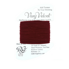 A spool of burgundy velvet needlepoint thread on a white backing card, with the brand name Very Velvet and product code V213 visible.