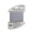 A spool of Very Velvet needlepoint thread in a light gray color, mounted on a white cardboard hanger with product details printed on it.